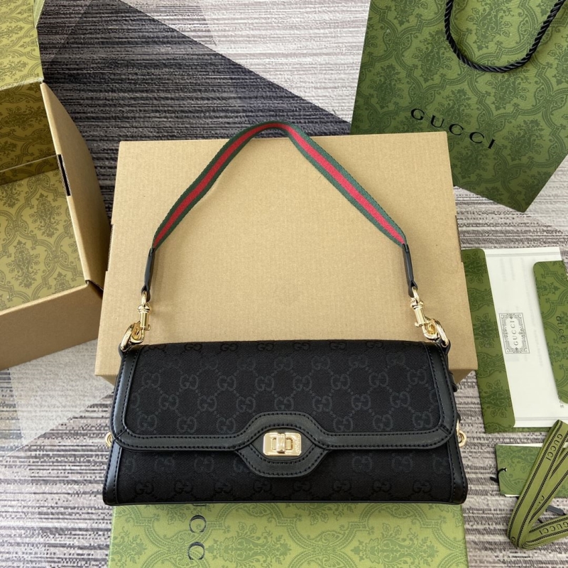 G*u*i top handle bags
